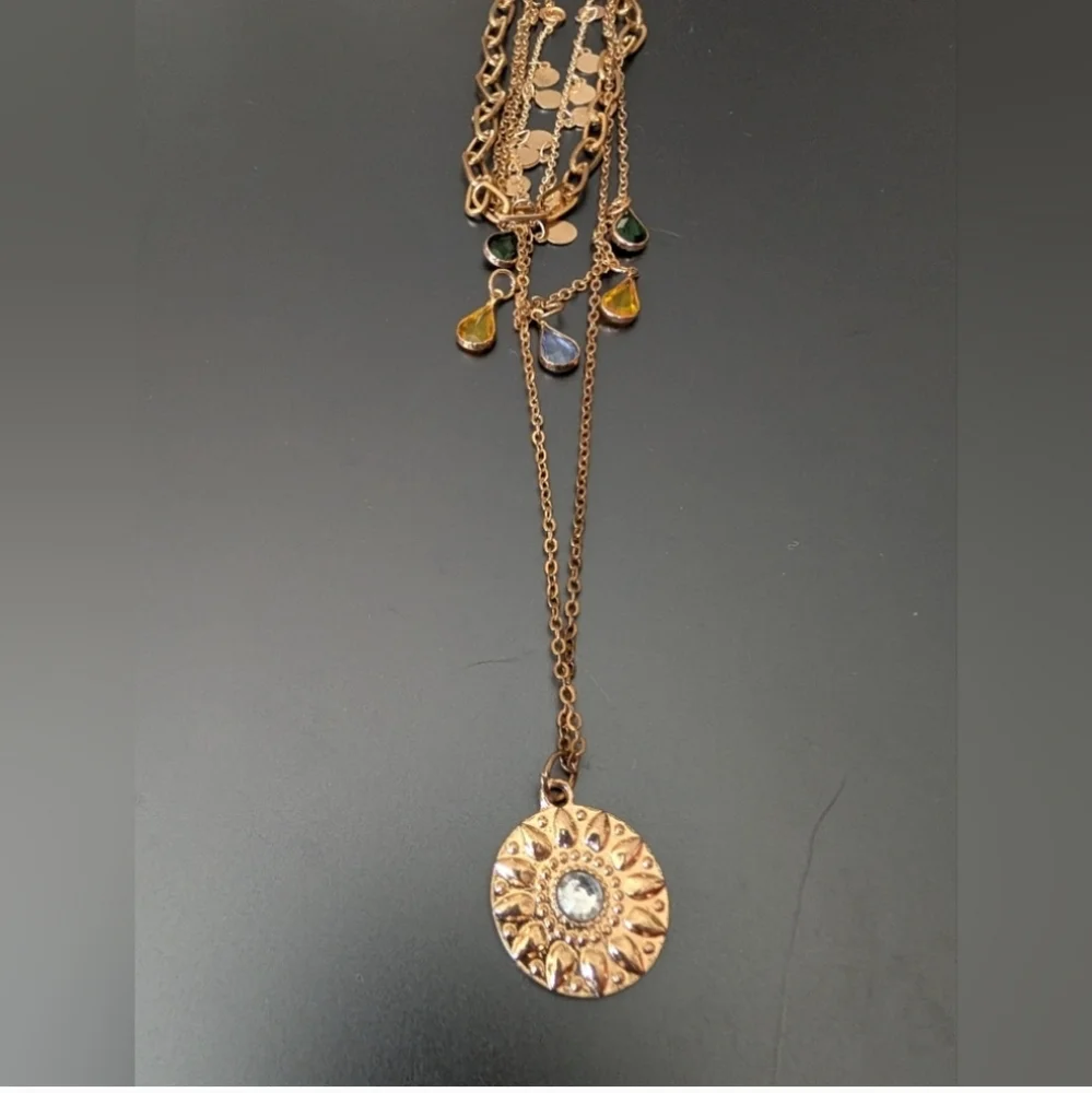 Elegant Triple-Strand Necklace in Coppery Metal with Crystal Teardrops